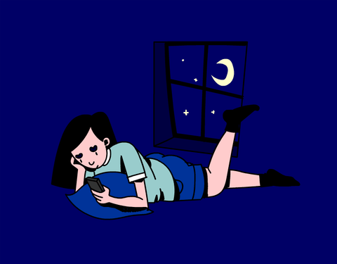 GIF of woman browsing phone at night