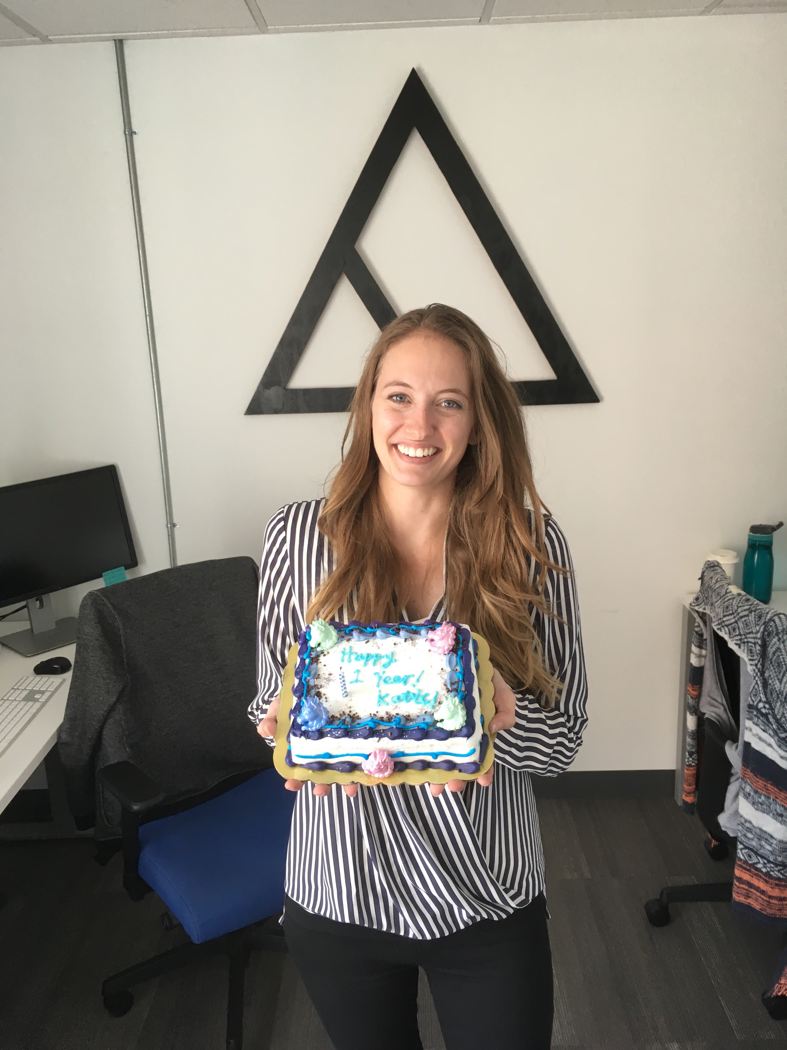 Katie Holding Anniversary Cake