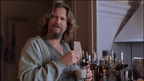 The dude stirring a drink while nodding his head