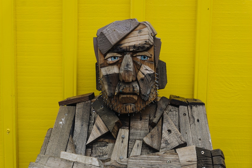 wooden man carving