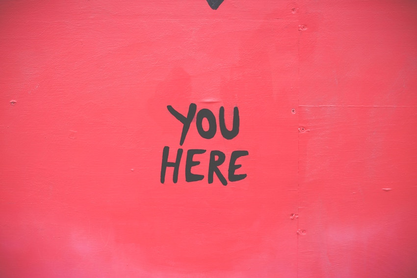 wall that says you here