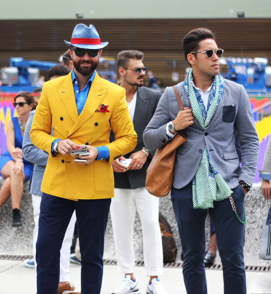 two men in unique suits