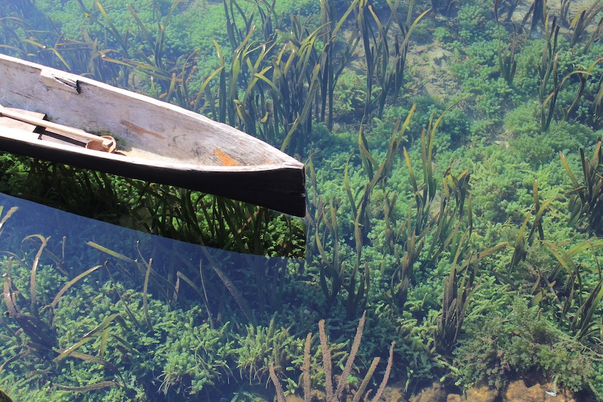 canoe over clear water