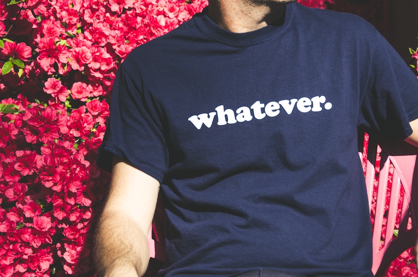man with shirt that says whatever