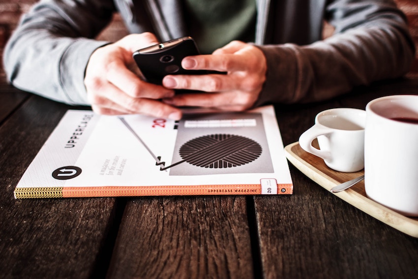 man checking mobile phone