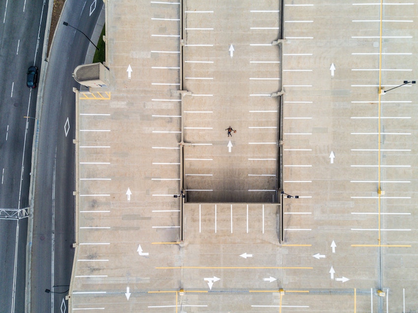 aerial view of person in parking lot