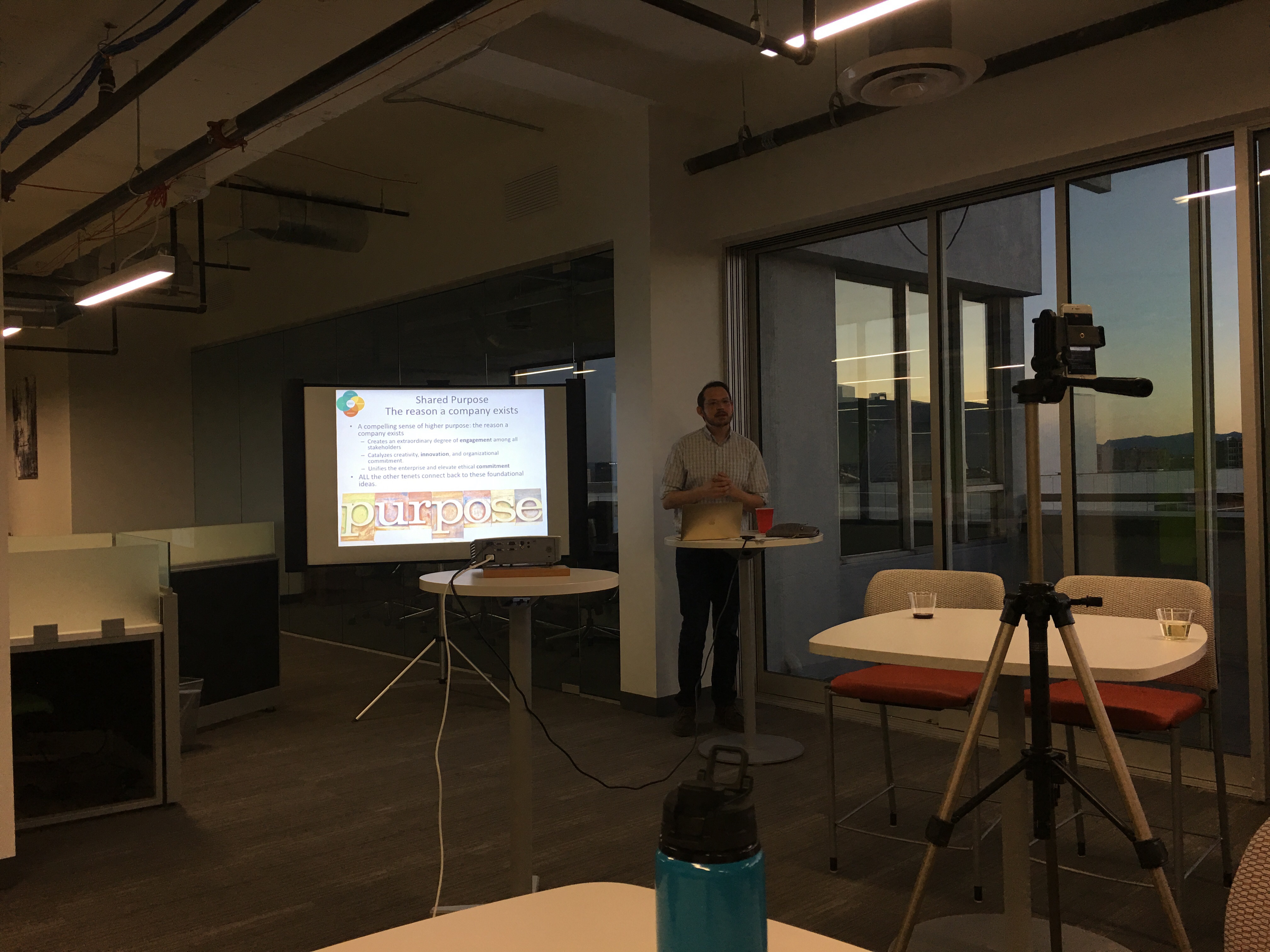 Adam Melnick presenting in front of group
