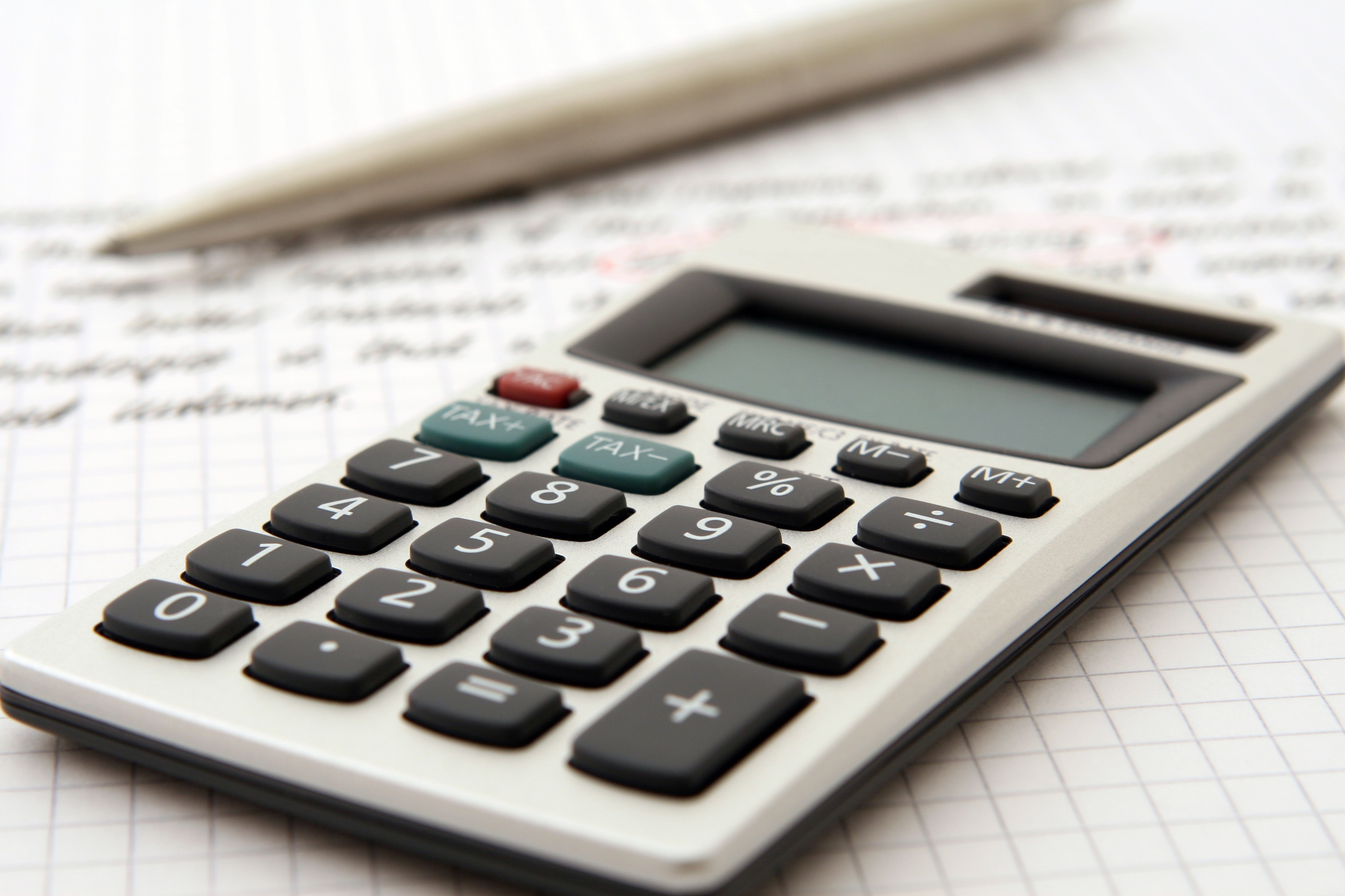 calculator on top of a notebook