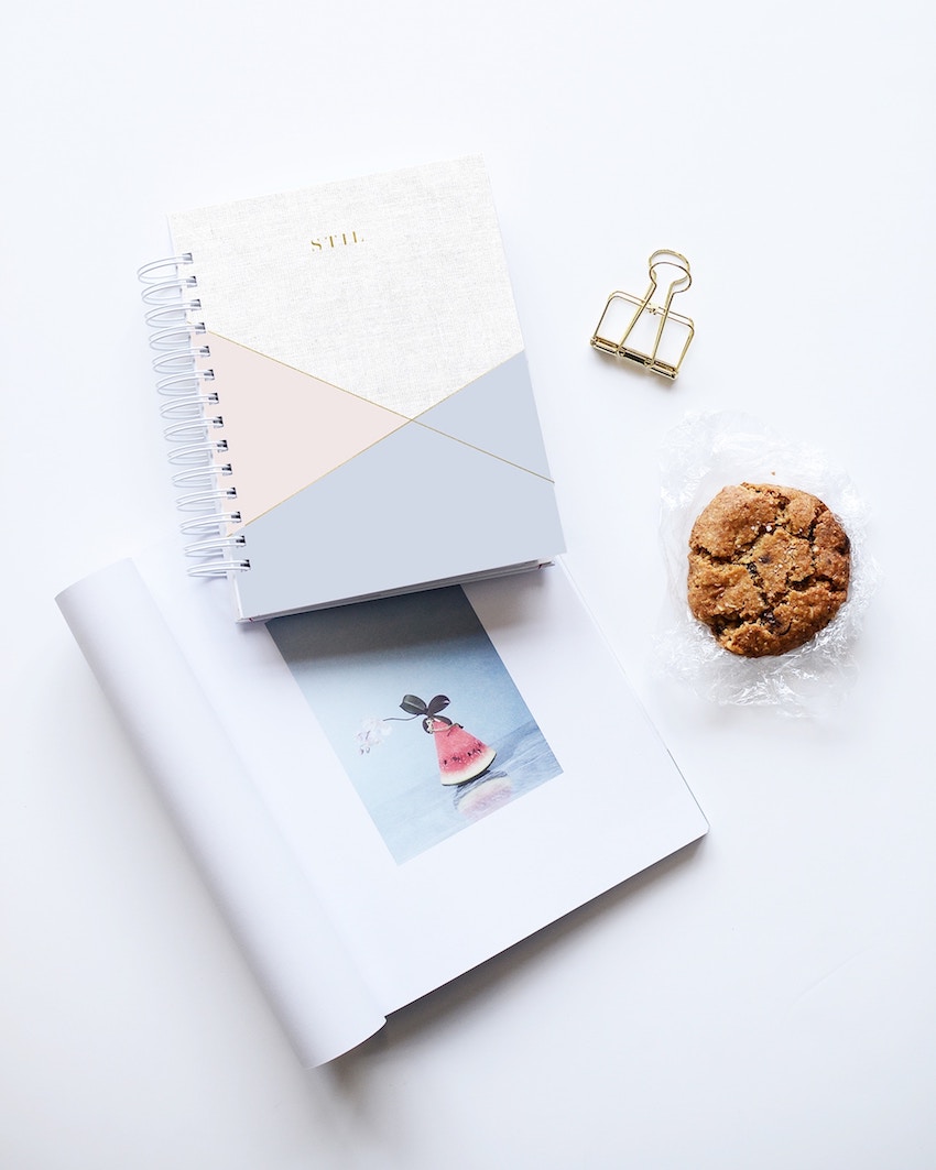 notebooks and cookies from a birds eye view