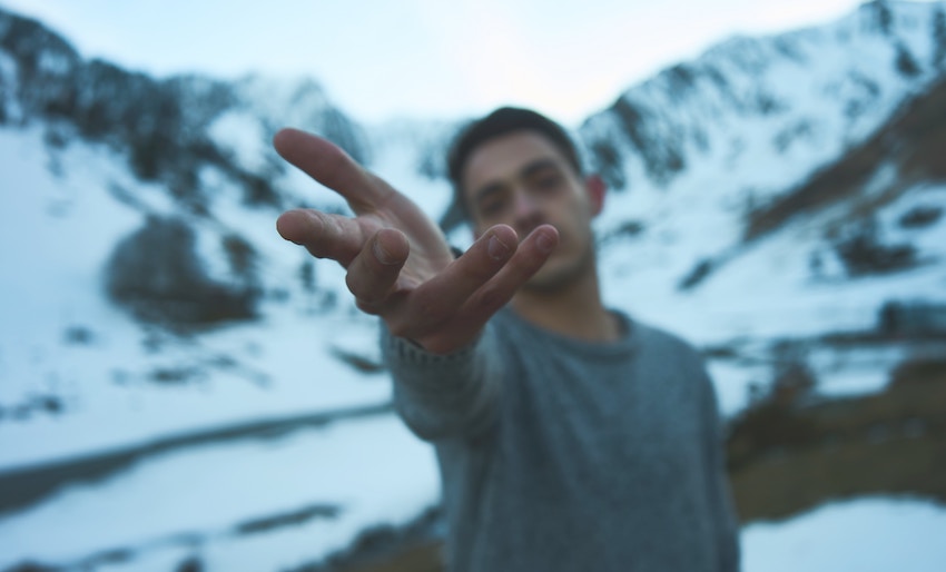 man extending hand